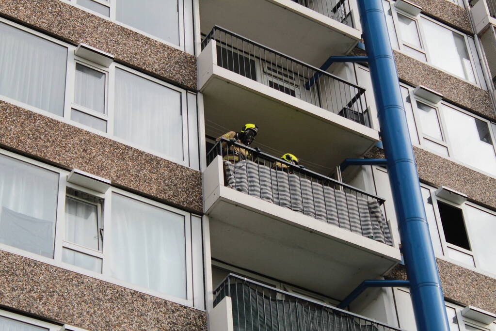 Rookontwikkeling in flat na brand