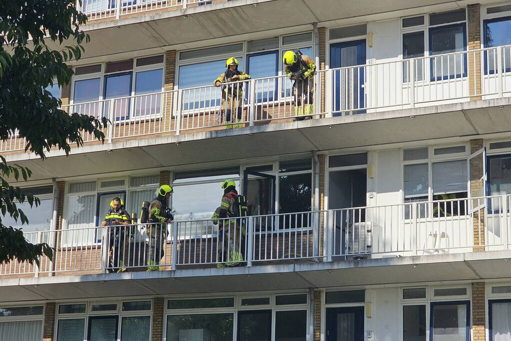 Persoon gewond bij brand in flatwoning