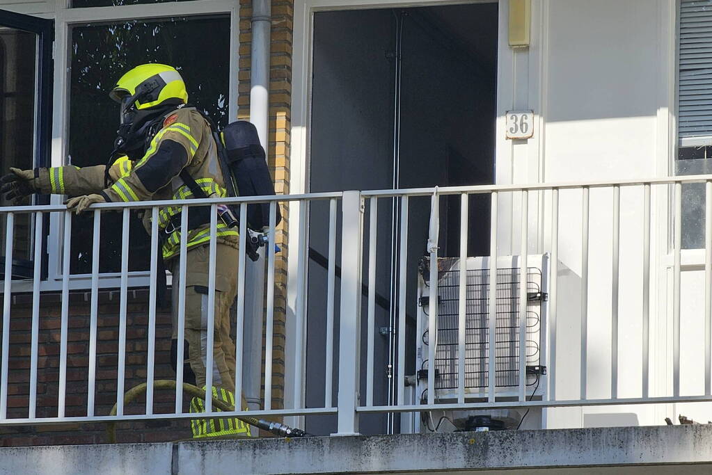 Persoon gewond bij brand in flatwoning