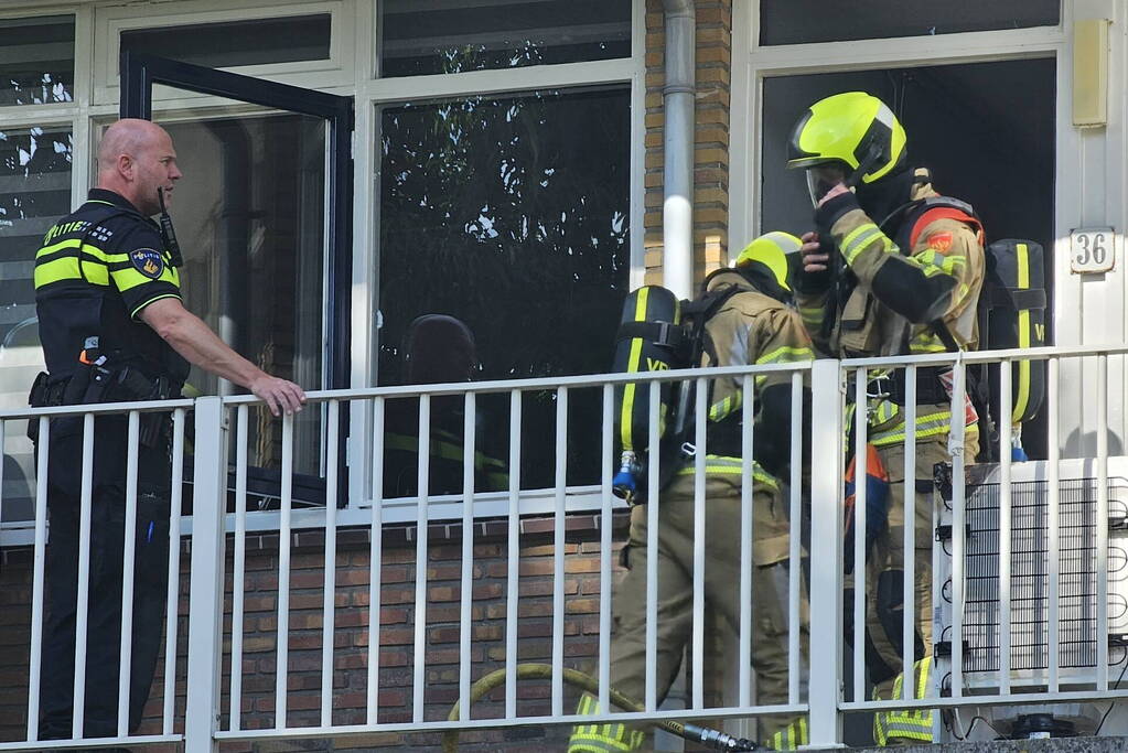 Persoon gewond bij brand in flatwoning