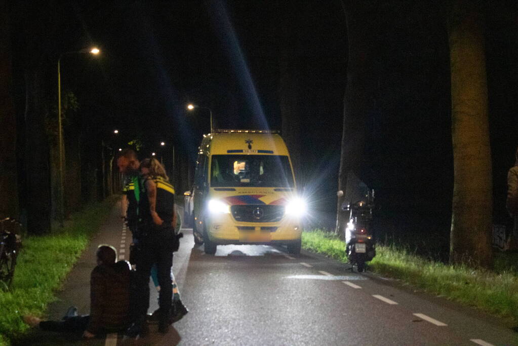 Scooter en fietser in botsing