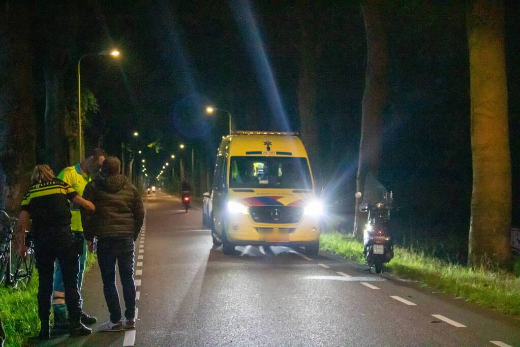 Scooter en fietser in botsing