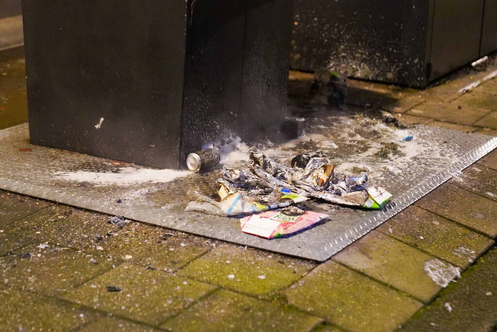 Rookontwikkeling door brand bij ondergrondse container