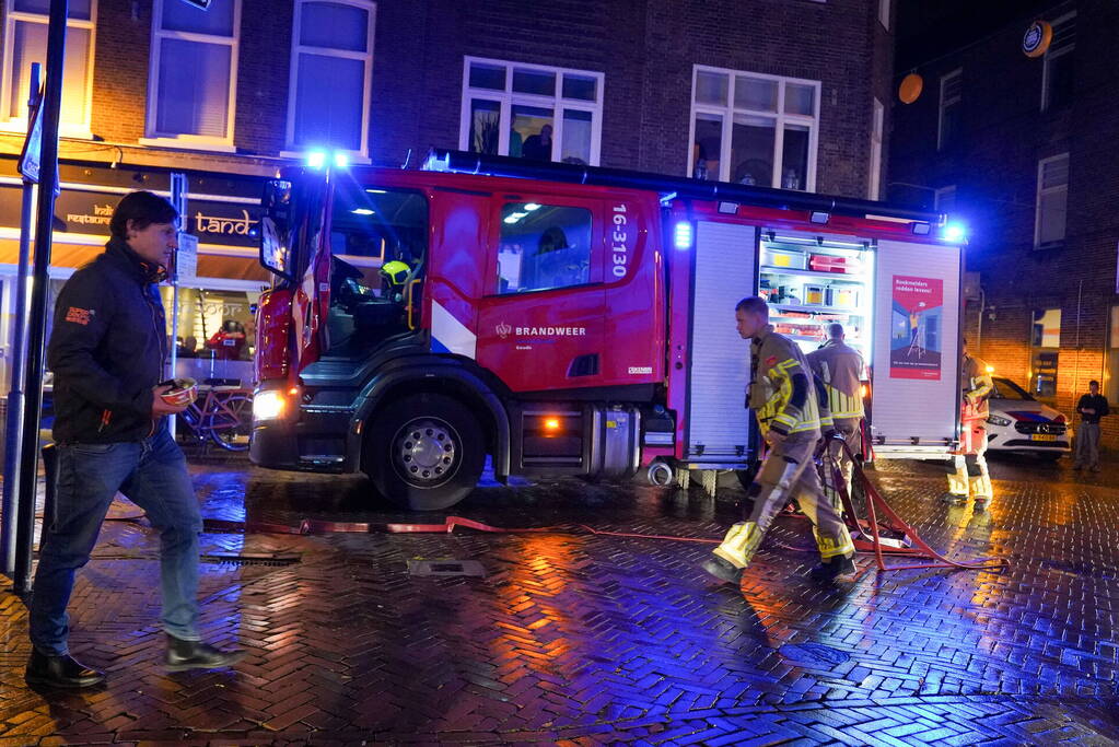 Brand in afzuigkap van woning