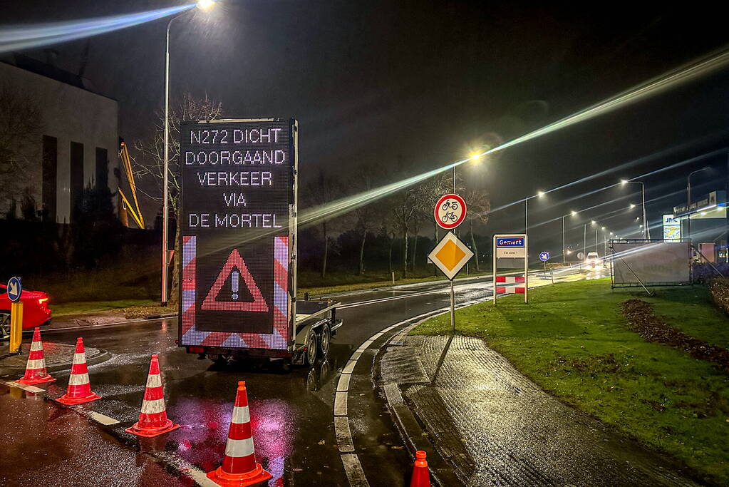 Weg afgesloten na overstroming door hevige regenval