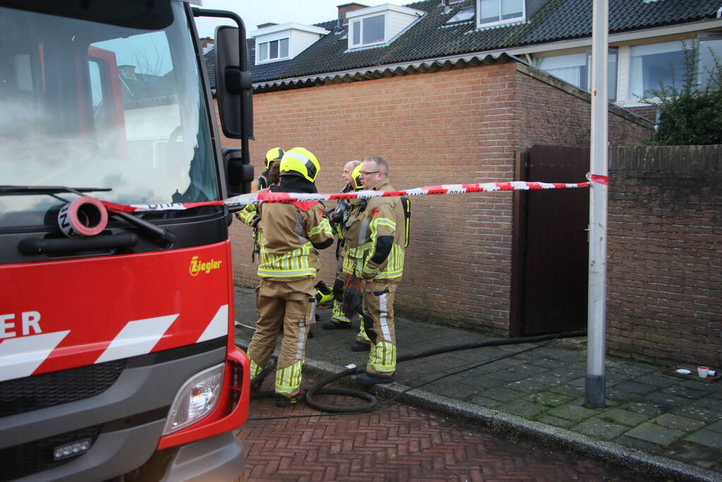 Flinke rookontwikkeling door brand na kortsluiting in koelkast