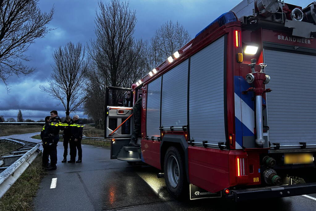 Auto te water inzittenden verlaten plaats ongeval