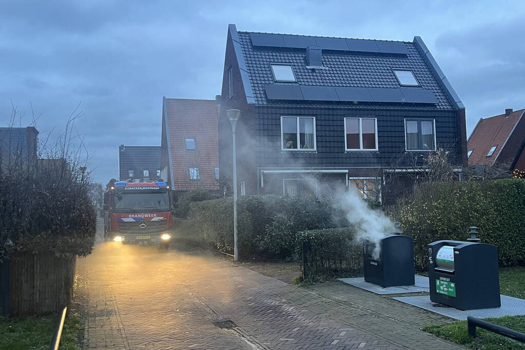 Ondergrondse container in brand