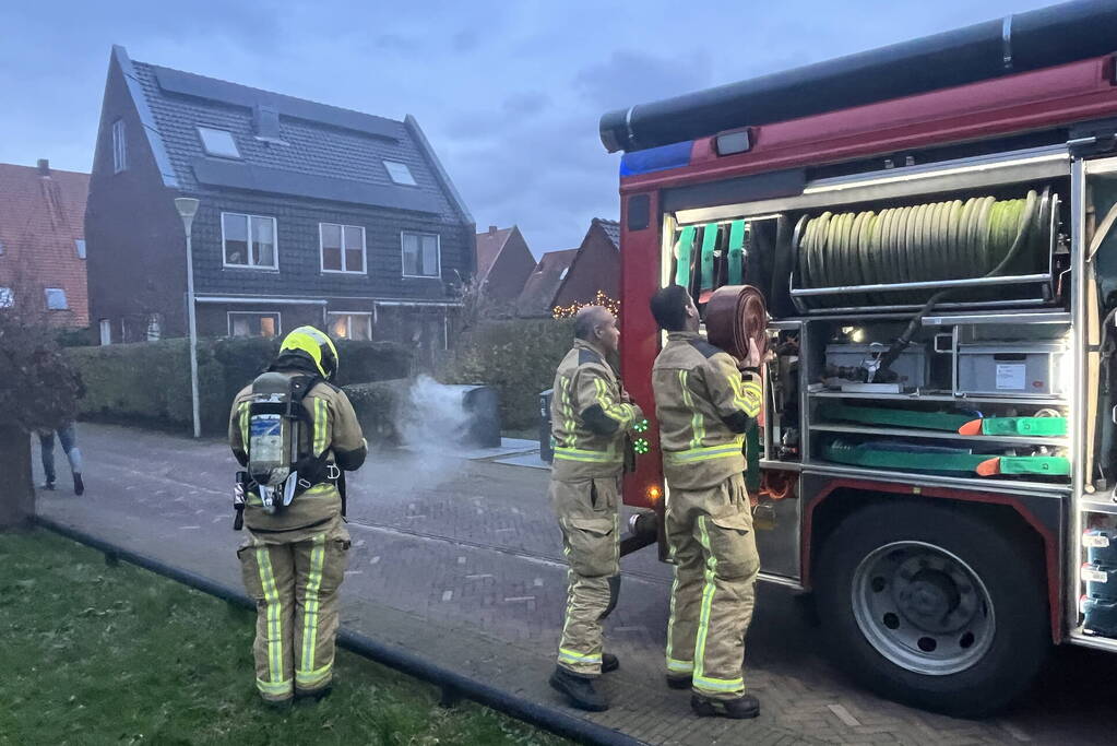 Ondergrondse container in brand