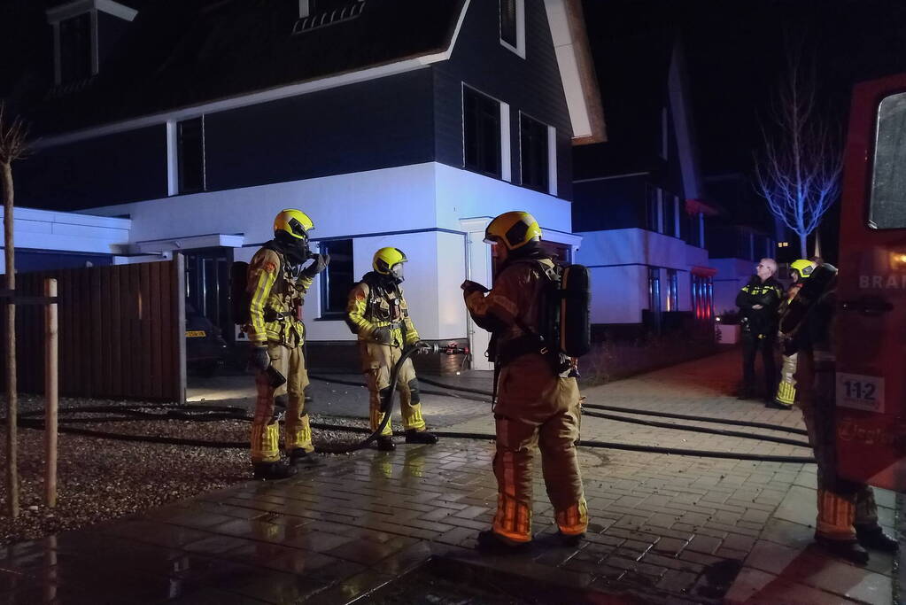 Afvalbrand bij woning