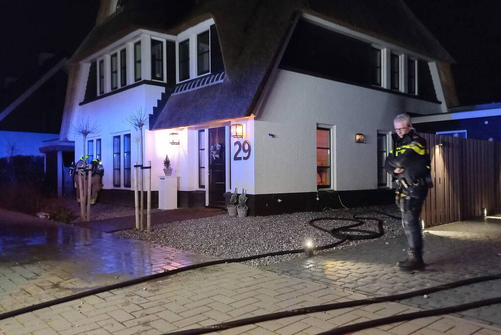 Afvalbrand bij woning