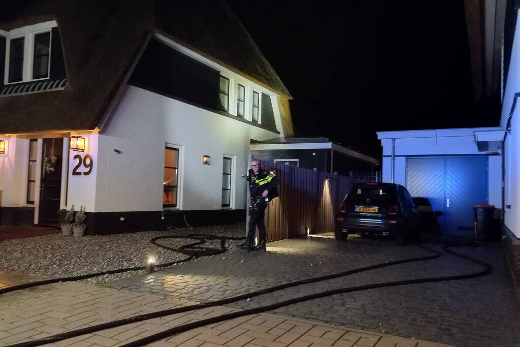 Afvalbrand bij woning