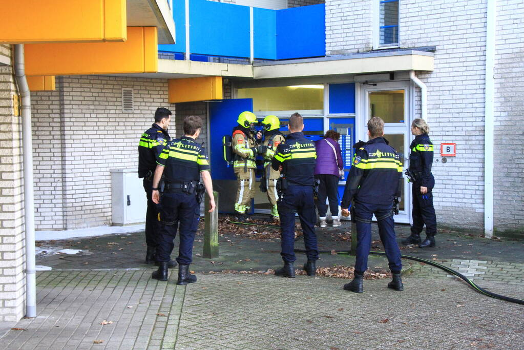 Rookontwikkeling bij brand in berging onder flat