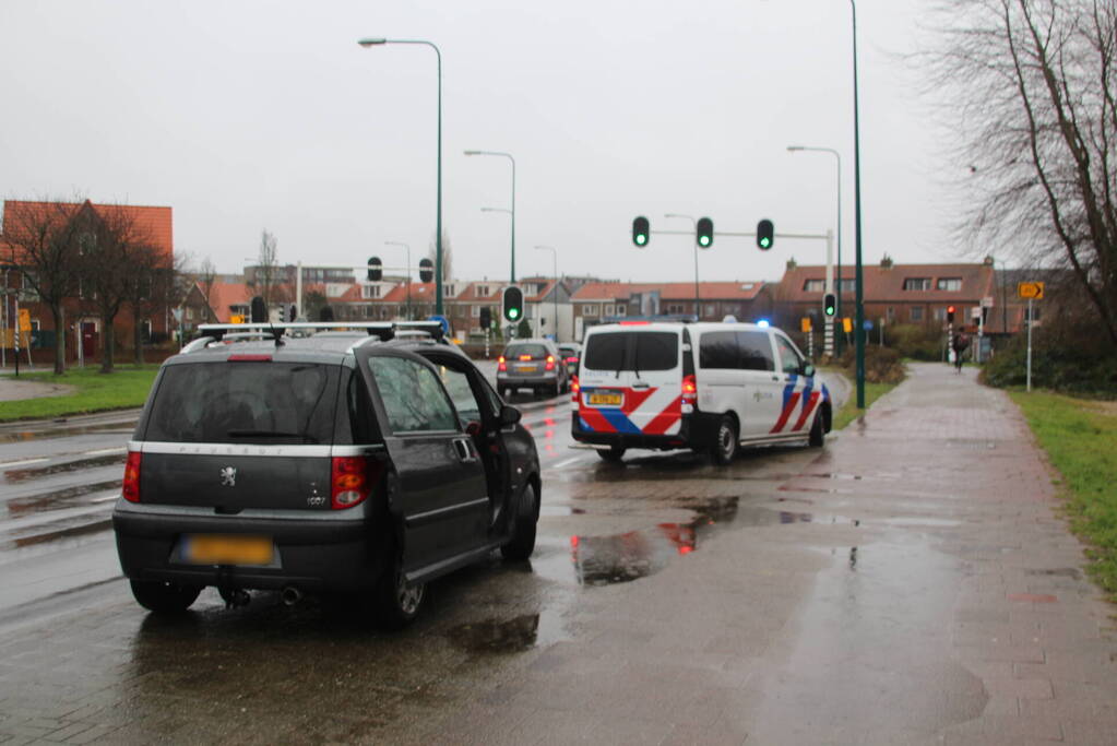 Schade bij kop-staartbotsing voor verkeerslicht