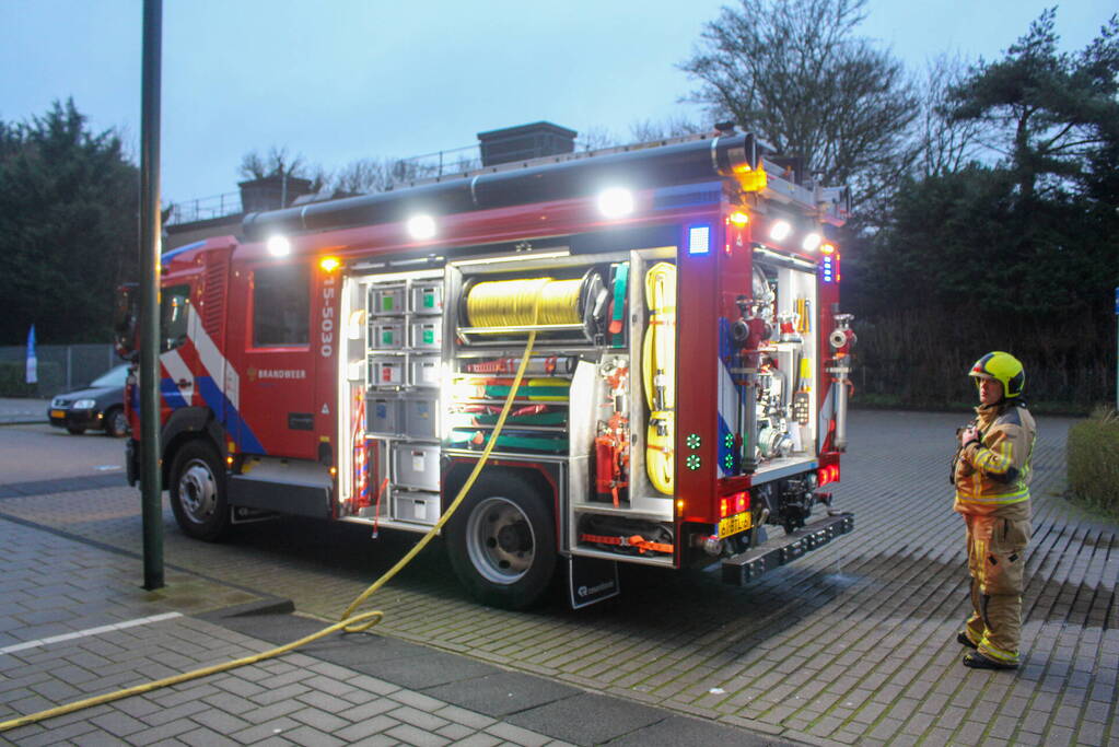 Rookontwikkeling in garage van flat