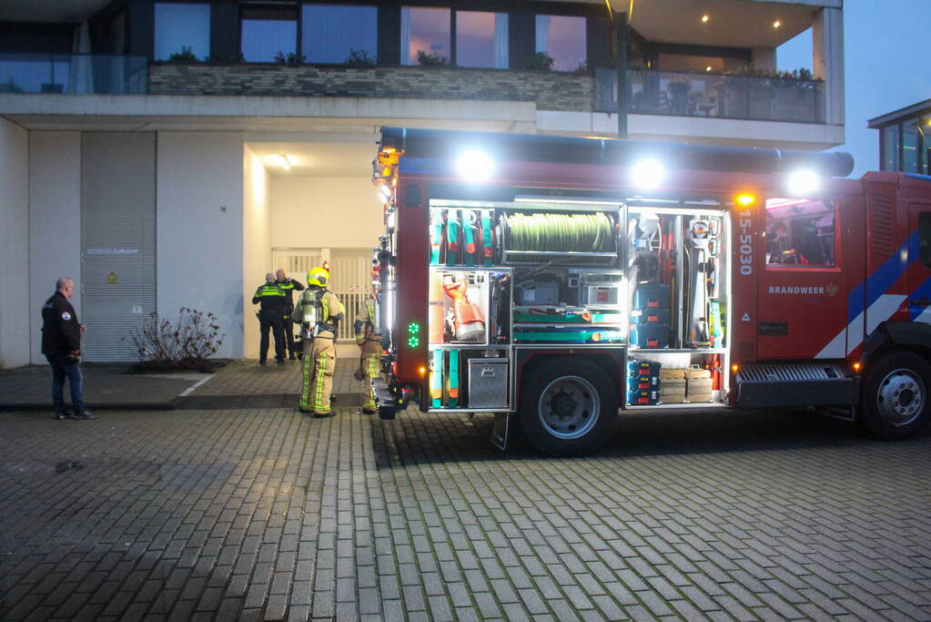 Rookontwikkeling in garage van flat