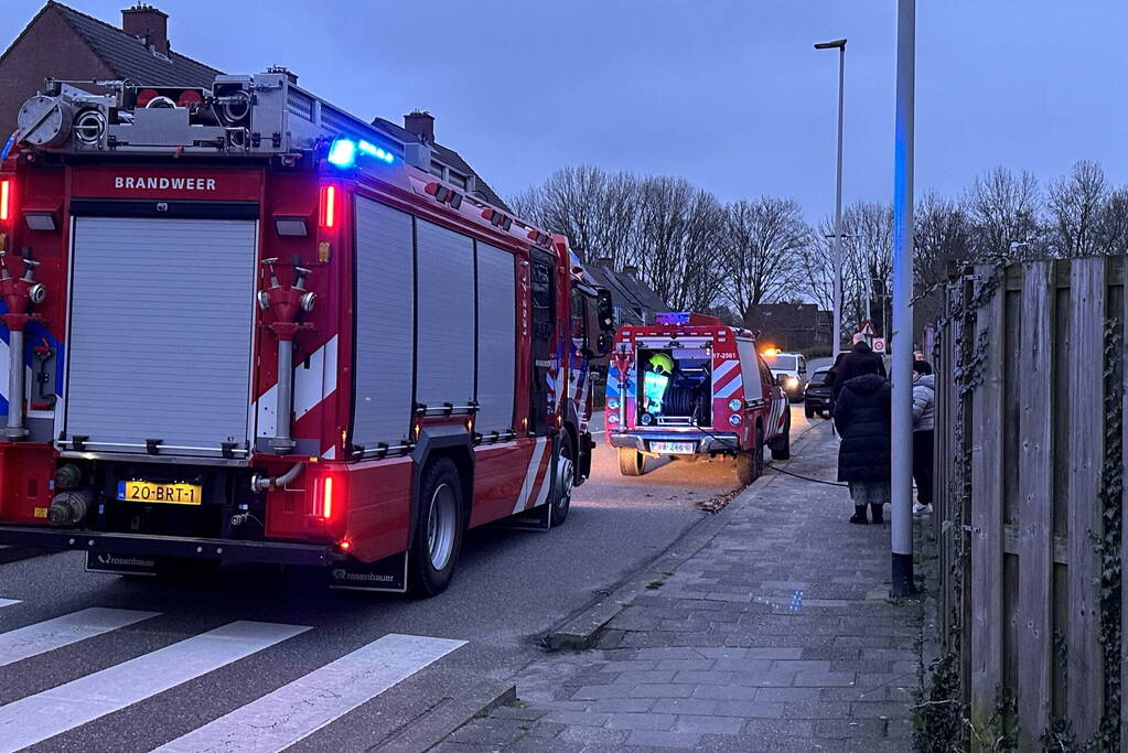 Gordijnen vatten vlam in woning