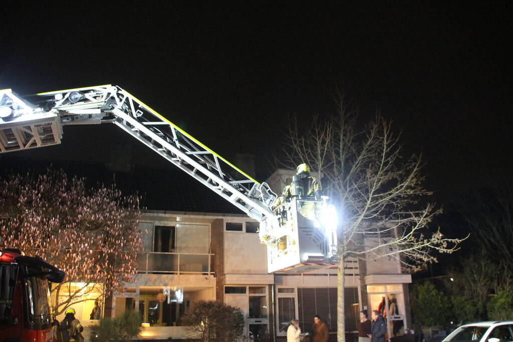 Flinke rookontwikkeling bij brand in schoorsteen