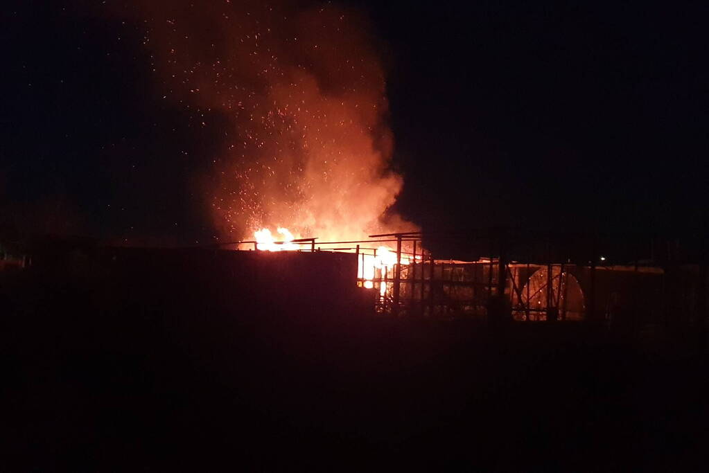 Uitslaande brand bij volkstuinencomplex