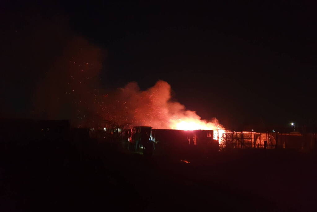 Uitslaande brand bij volkstuinencomplex