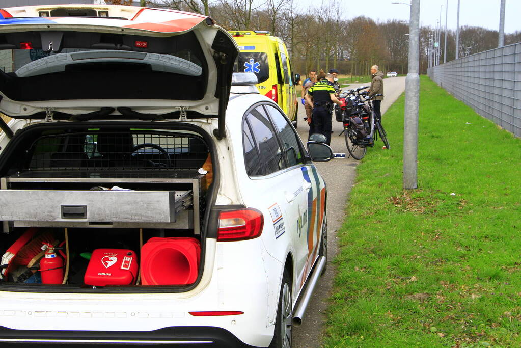 Groep fietsers ten val