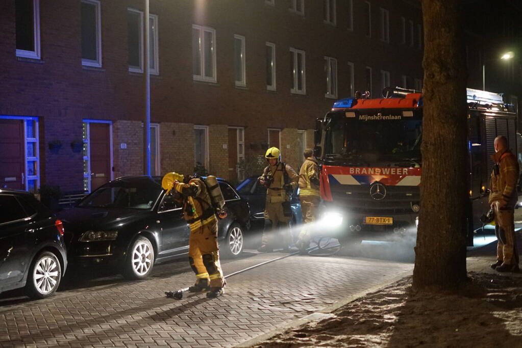 Brand in container met bouwafval