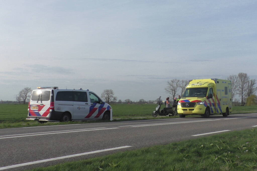 Scooterrijder en fietser in botsing