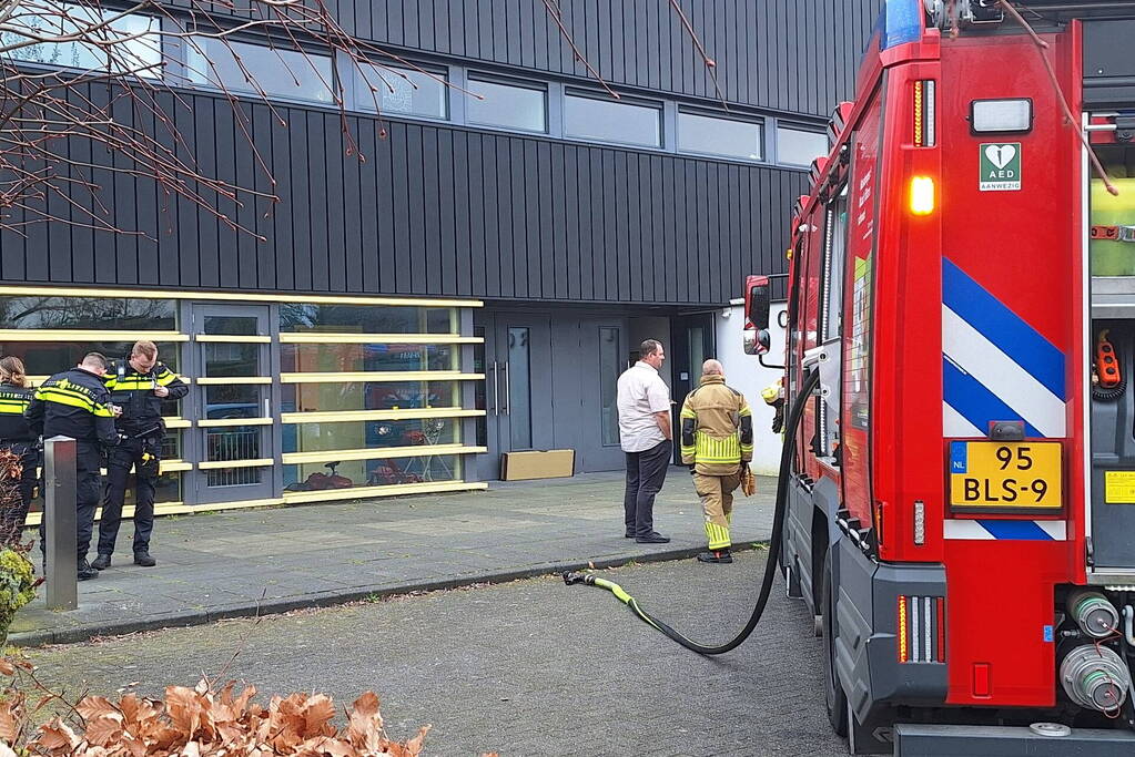 Rookontwikkeling in kerk door TL-balk