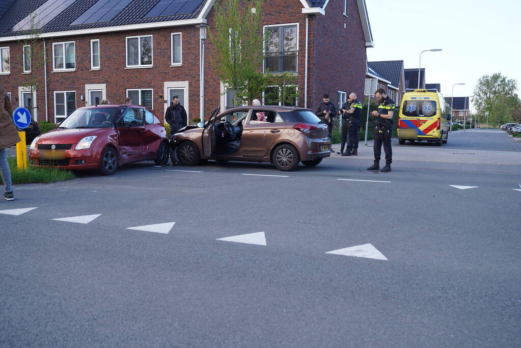 Schade na botsing op kruising