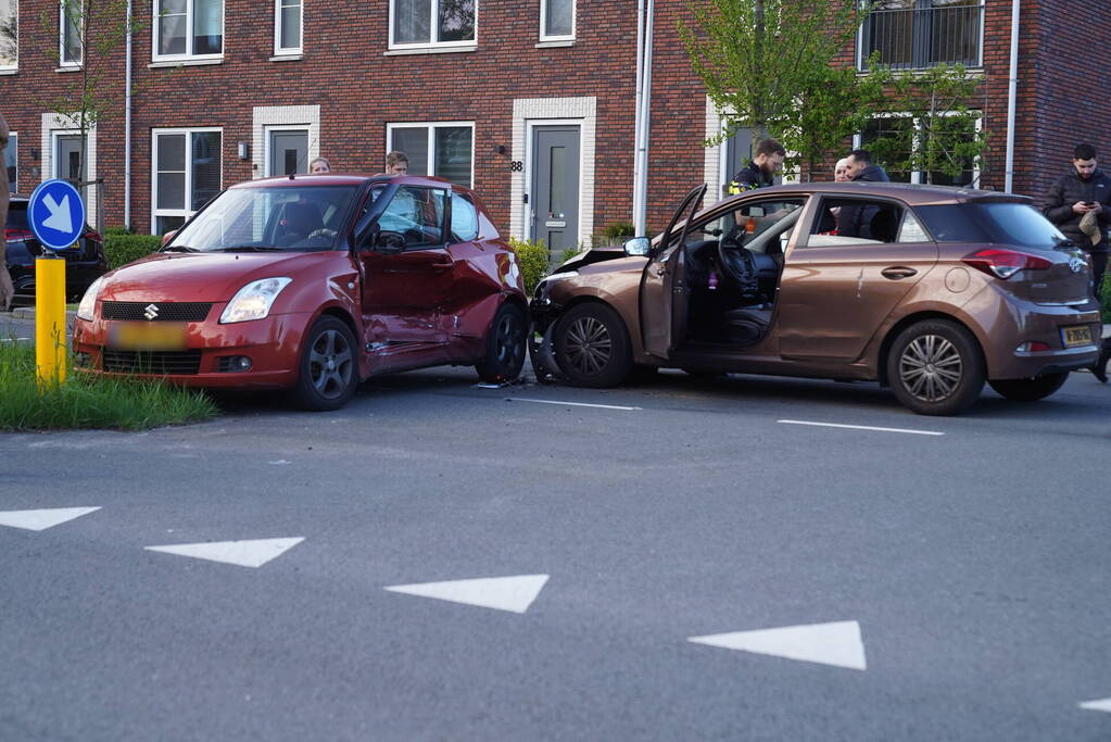 Schade na botsing op kruising