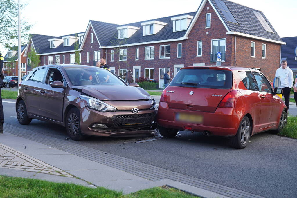 Schade na botsing op kruising