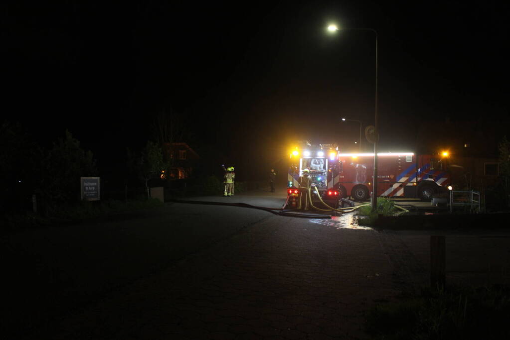 Grote uitslaande brand in stal