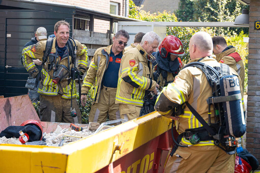 Klusjesmannen blussen brand in woning