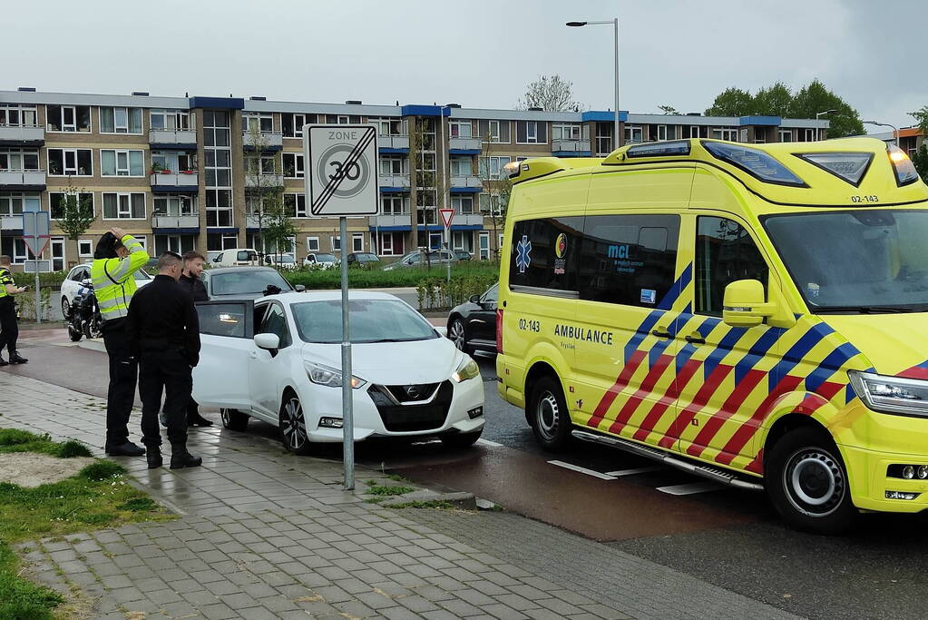 Automobilist en E-biker in botsing