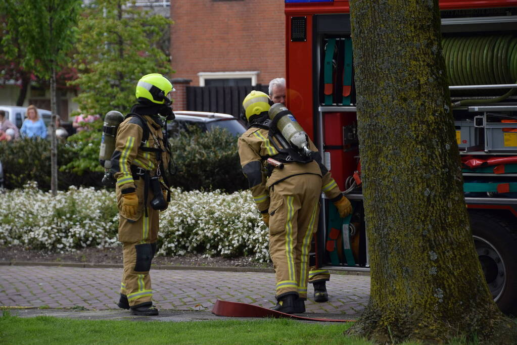 Fikse rookontwikkeling bij brand in textiel container