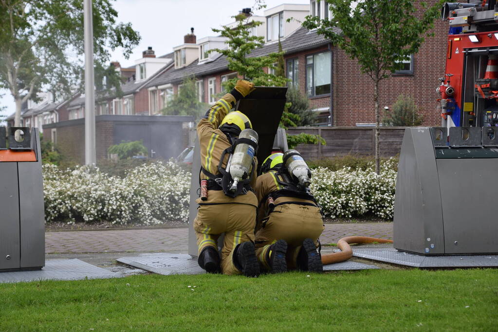 Fikse rookontwikkeling bij brand in textiel container