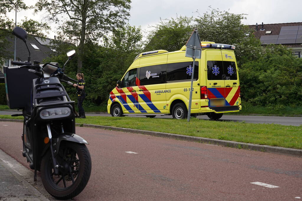 Scooter in botsing met fietser