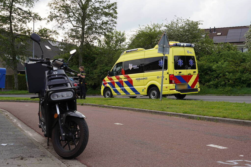 Scooter in botsing met fietser