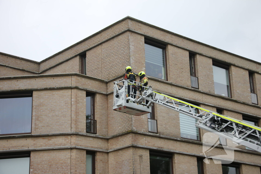 Brandweer helpt buitengesloten bewoonster