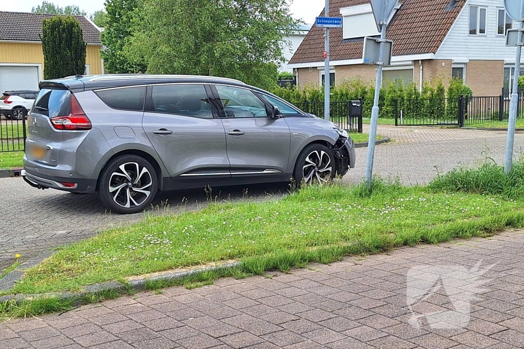 Schade na aanrijding tussen auto en scooter