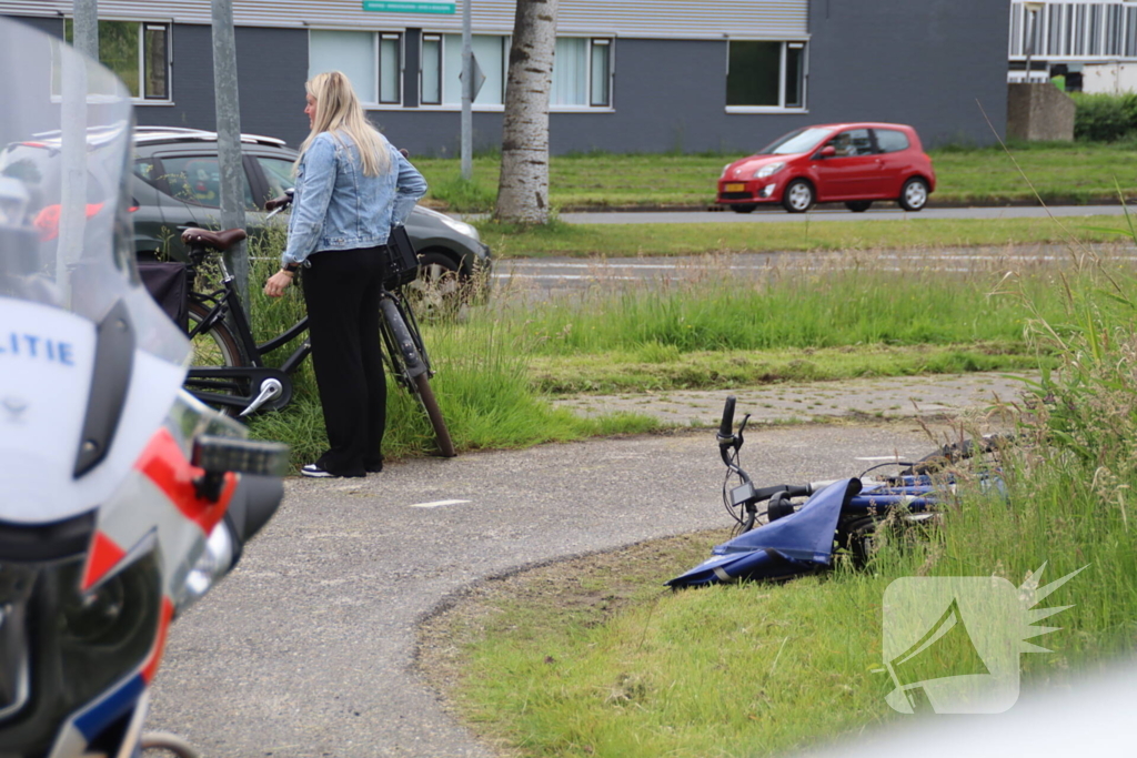 Twee fietsers met elkaar in botsing