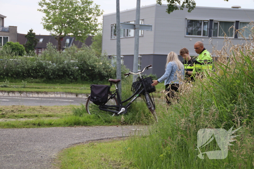 Twee fietsers met elkaar in botsing