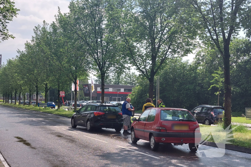 Flinke schade na botsing tussen auto's