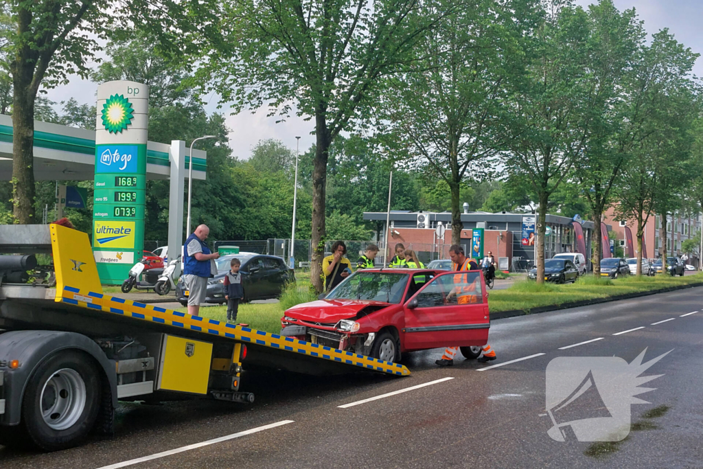 Flinke schade na botsing tussen auto's