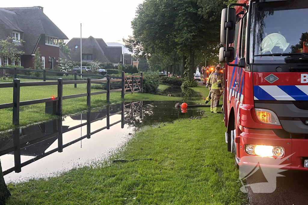 Brandweer pompt overtollig water weg