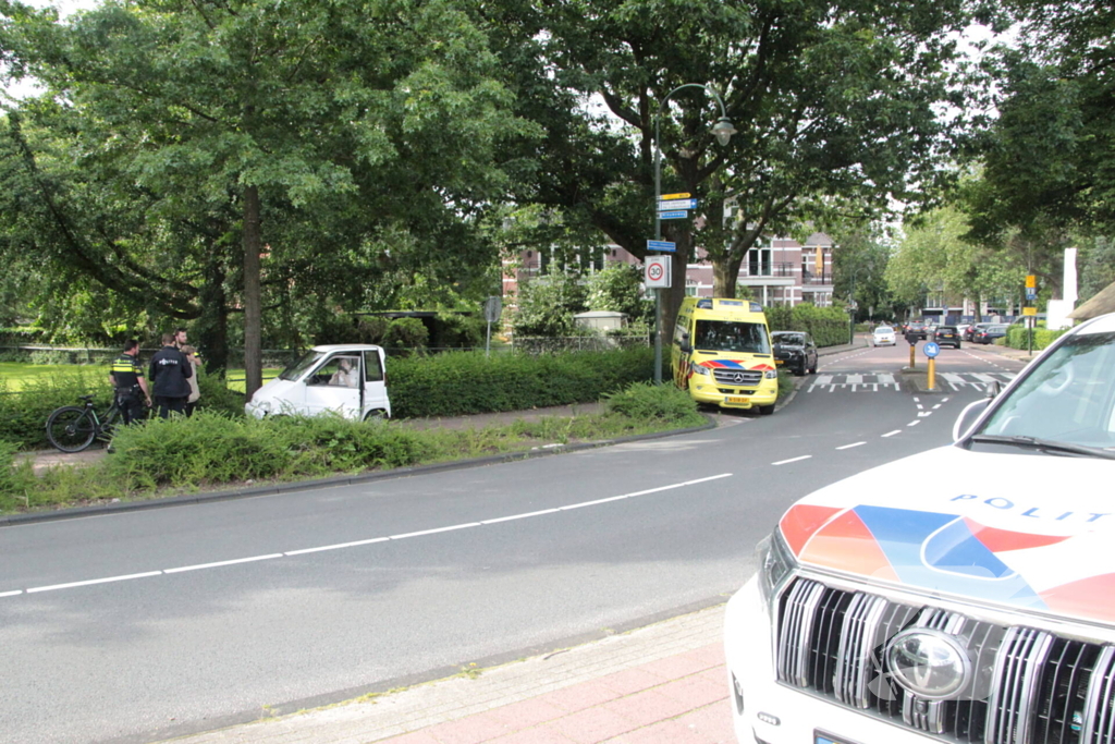 Brommobiel klapt op fietser