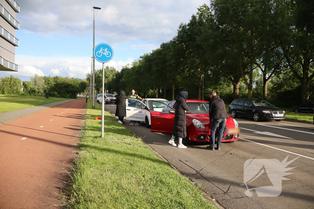 Kop-staart aanrijding voor verkeerlichten