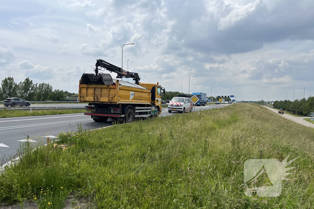 Auto te water na frontale aanrijding met vrachtwagen