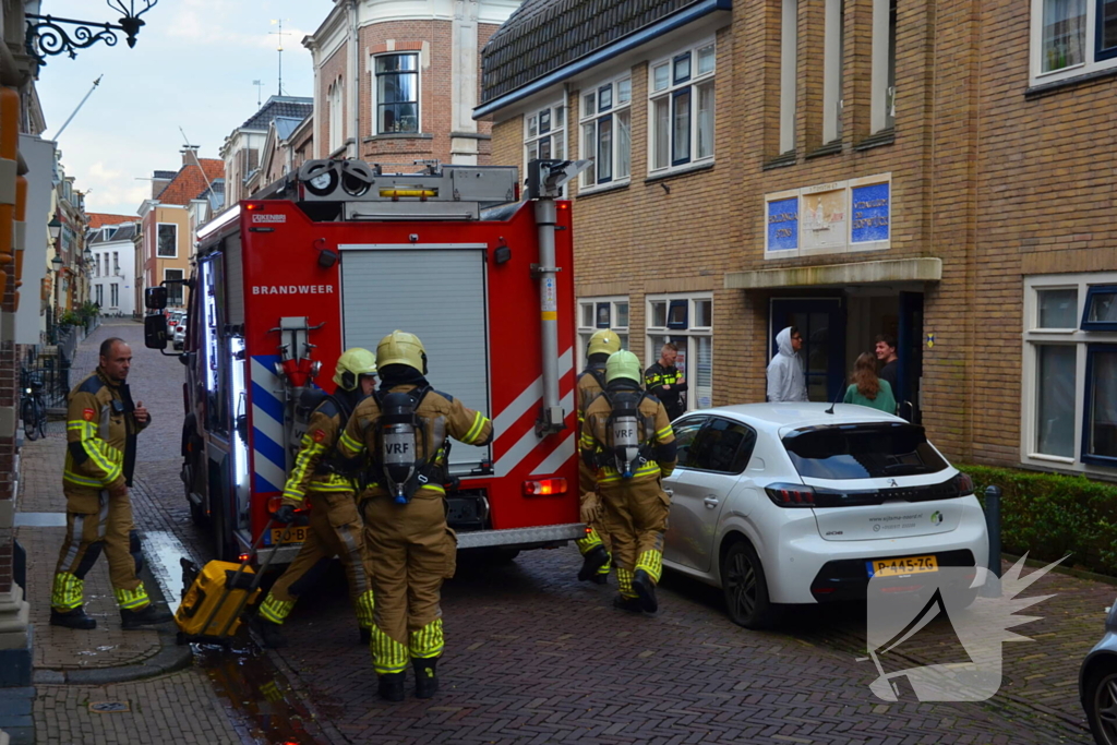 Appartement vol rook door keukenbrand