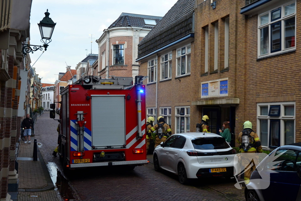 Appartement vol rook door keukenbrand